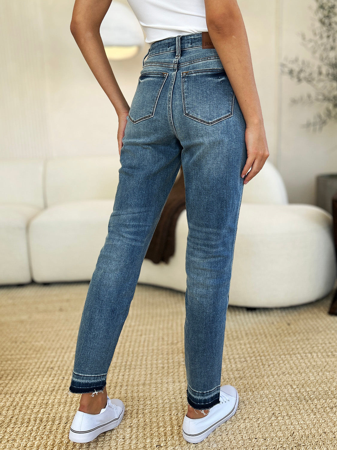 Mid Rise Rigid Magic Release Hem Jeans